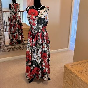 Beautiful floral maxi dress with fitted top and full bottom.